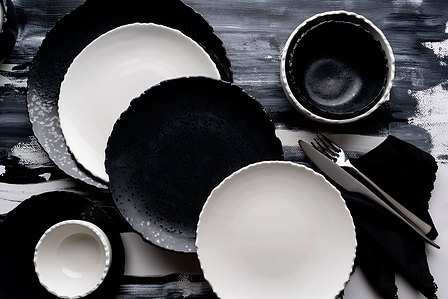play with monotone plates on a painting background creative shoot with best product photographer ashish gurbani based in mumbai india