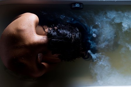 nude girl in bathtub lost in thoughts top angle bottom shoot concept on depressed girl photoshoot by top indian advertising photographer based in mumbai india