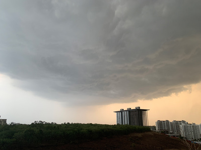 photograph of heavy monsoon clouds overcast over pune city during my quarantine shot by best advertising photographer ashish gurbani based in Mumbai india