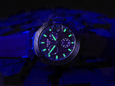 a glow in the dark neon photoshoot of luxury tissot watch by best commercial photography in mumbai india