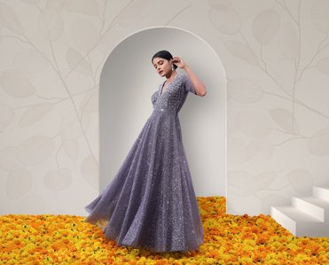 a female model wearing a party wear gown garment for a clothing brand campaign shoot by best advertising photographer based in pune india