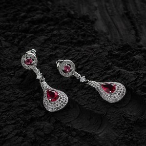 raw still life jewellery photoshoot on black powder product photography shoot with best jewellery photographer based in mumbai india