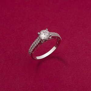 an artificial solitaire diamond ring shot on a colour background using studio lighting strobes for a jewellery brand based in mumbai india brand campaign by best jewellery product photographer based in mumbai india