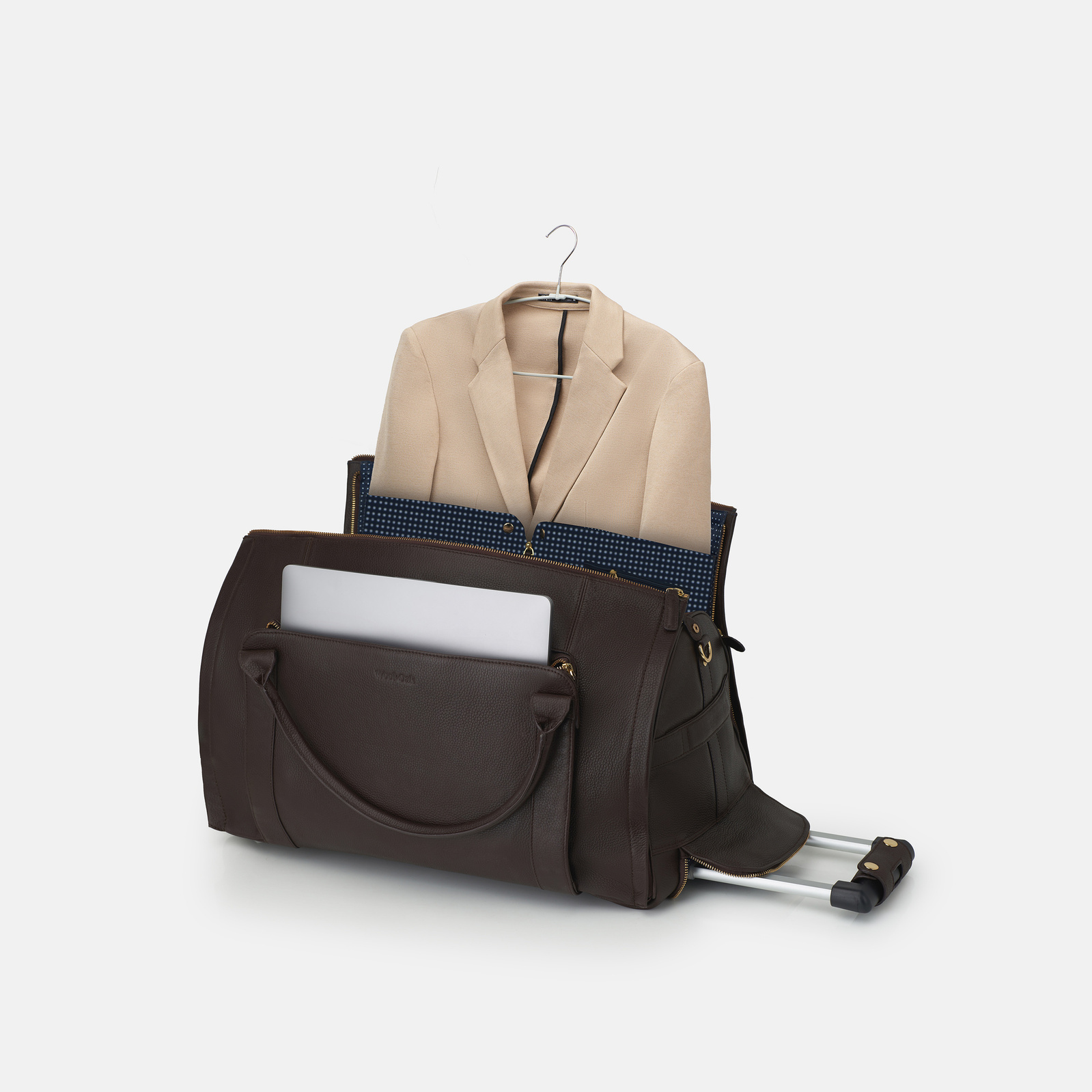 a leather bag with a formal jacket for e commerce photoshoot in studio pune