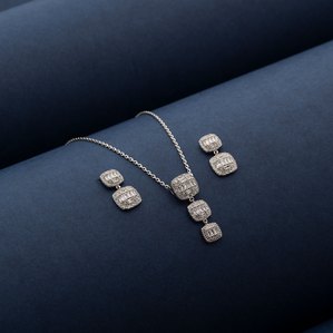 a product photoshoot of a earrings set jewellery product shoot with a fresh blue background using minimalism approach photography by best advertising photographer ashish gurbani  based in mumbai india