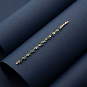  a minimal approach professional concept shoot of a sleek green bracelet with rare gemstones shot by leading advertising photographer ashish gurbani based in mumbai india