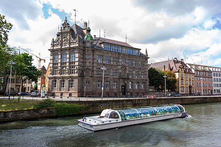 Tourists in a boat, sailing across a canal and enjoying the pleasant weather shot by Ashish Gurbani top fashion photographer based in Mumbai India.  