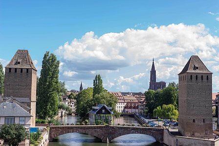 Old overpass shining in the daylight built across a river stream in Europe shot by Ashish Gurbani best advertising photographer based in Mumbai India.