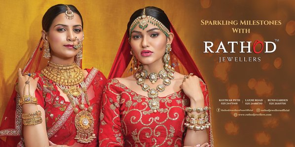 stunning indian brides posing in front of a haldi yellow backdrop for a creative indian jewellery brand rathod jewellers latest bridal jewellery campaign shot by creative jewellery photographer based in bangalore india