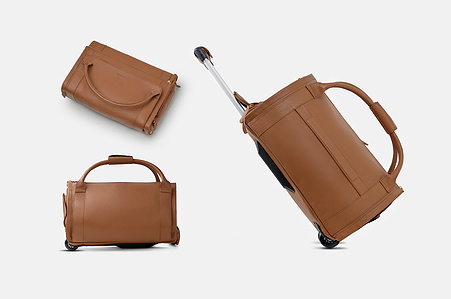 a trio of three tan leather bags photographed by creative luxury photography in pune and mumbai