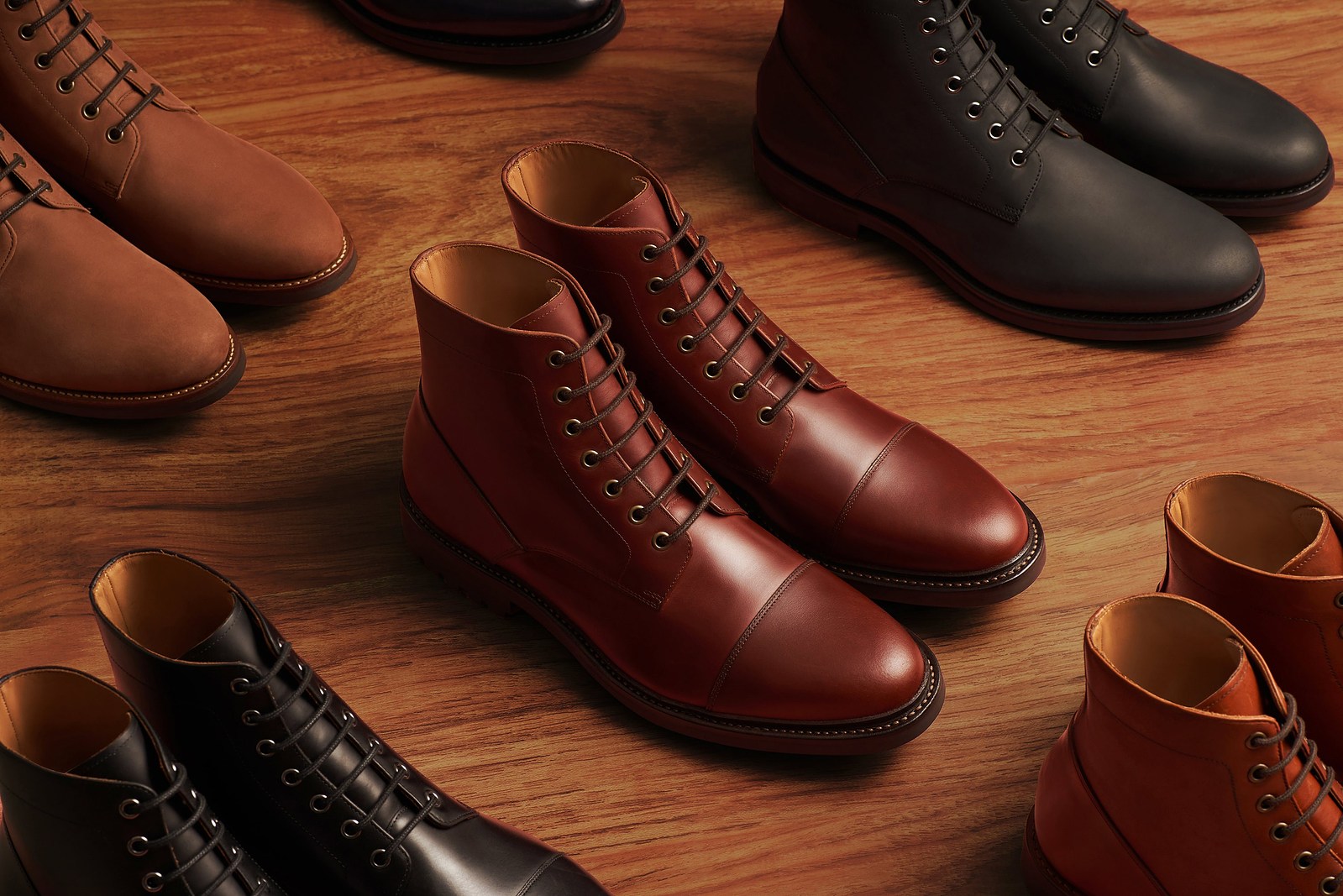 acollection of luxury leather boots photographed by best product photographer mumbai