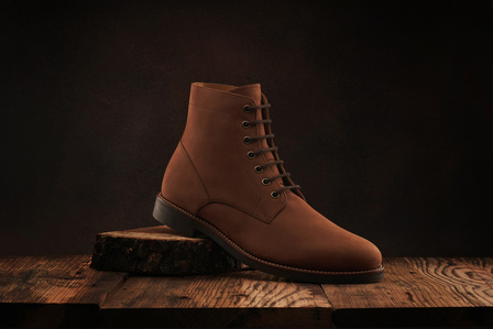 a suede leather brown shoe photographed in studio lighting setup by best commercial photographer in pune