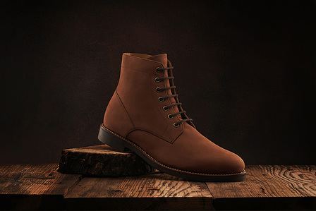 a suede leather brown shoe photographed in studio lighting setup by best commercial photographer in pune