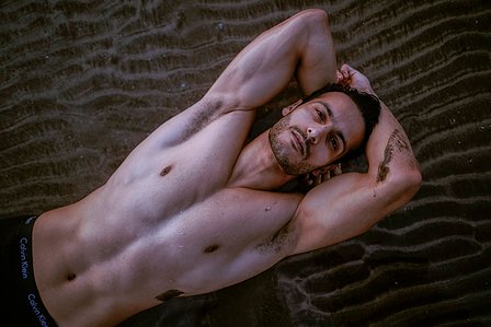 top down portrait shot of actor angel singh on the beach sand background shoot with luxury lifestyle photographer ashish gurbani based in Mumbai india