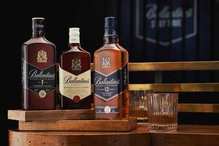 A group shot of Ballentine Scotch whiskey styled neatly on top of table captured by brand photographer in Pune, India
