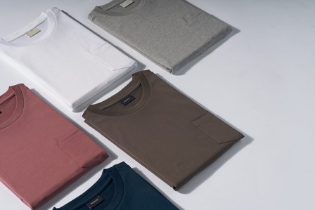 a group shot of multiple t shirt colours in high end fabric photographed by luxury product photographer from pune india
