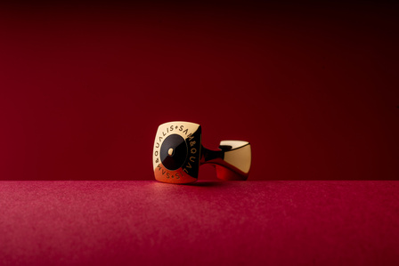 shooting a pure golden cufflink for a australian based brand photographed in a conceptual studio setup by best luxury product photographer based in mumbai india. 