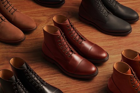 a group image of luxury leather boots stylized for brand footwear photo studio near mumbai india 