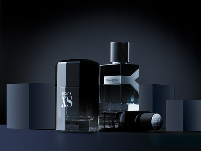 a group product photograph images of black-themed perfumes on a black photography set for a branding campaign in pune india