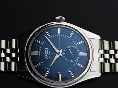 a close up of a blue dial watch photoshoot by best advertising photographer based in pune india