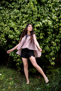 pose by female model to show the beauty of nature in designer garments for photoshoot by top advertising photographer based in mumbai india