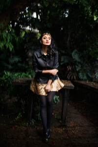 female model posing in spunk garment for conceptual photoshoot  in dark forest for top adverting photographer based in mumbai