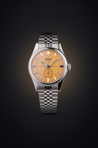 a retro yellow dial watch photographed in a conceptual glow background shoot by best advertising photography studio pune