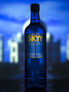 an amazing blue skyy vodka bottle in front of taj mahal photographed by indias best vodka and bottle photographer based in pune india