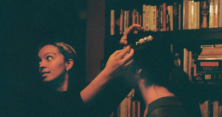 Aszana and Connie preparing for presentation of collection #2, A City Overgrown, at Fantasy Machine 2023. Photo by Athena Intanate, @atinzzz