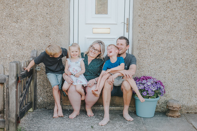 Family of five on doorstep- North Yorkshire Family Photography