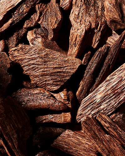 Close-up image of Oud wood chunks.