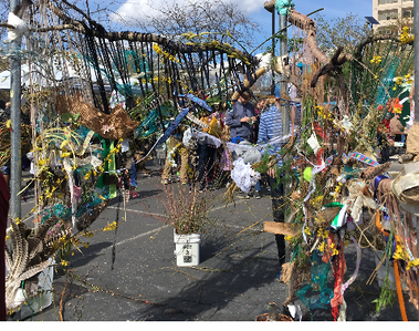 Community art installation made with recycled materials. 