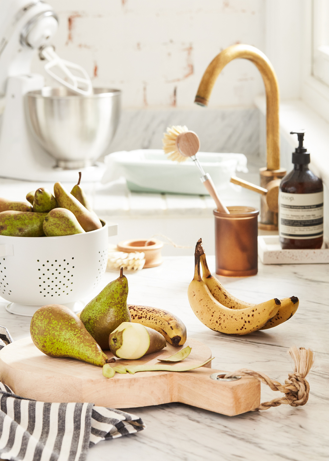 Lifestyle food photography for Banana Loaf recipe, including ingredients and serving suggestions including salted caramel sauce, shot by London based food and tableware photographer Lol Johnson. Food prep and props styling by Liz Cooper.
