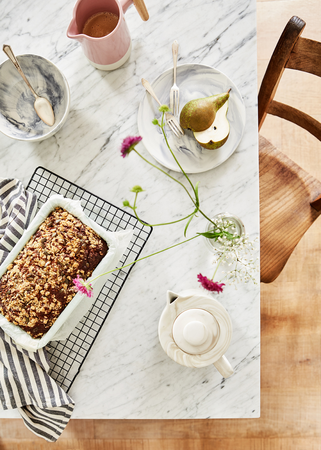 Lifestyle food photography for Banana Loaf recipe, including ingredients and serving suggestions including salted caramel sauce, shot by London based food and tableware photographer Lol Johnson. Food prep and props styling by Liz Cooper.