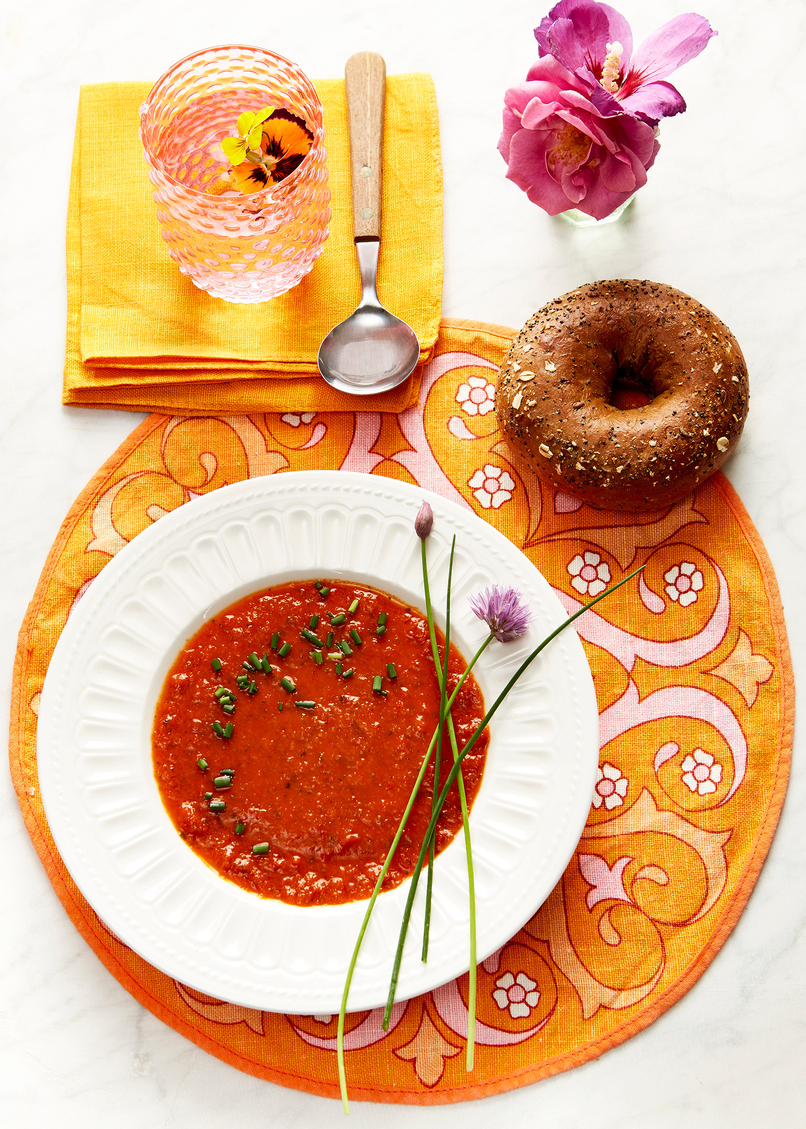 Still life food photography of tomato soup and a wholemeal bagel for Penguin Foods at Tesco. Shot by London based photographer Lol Johnson and styled by Liz Cooper