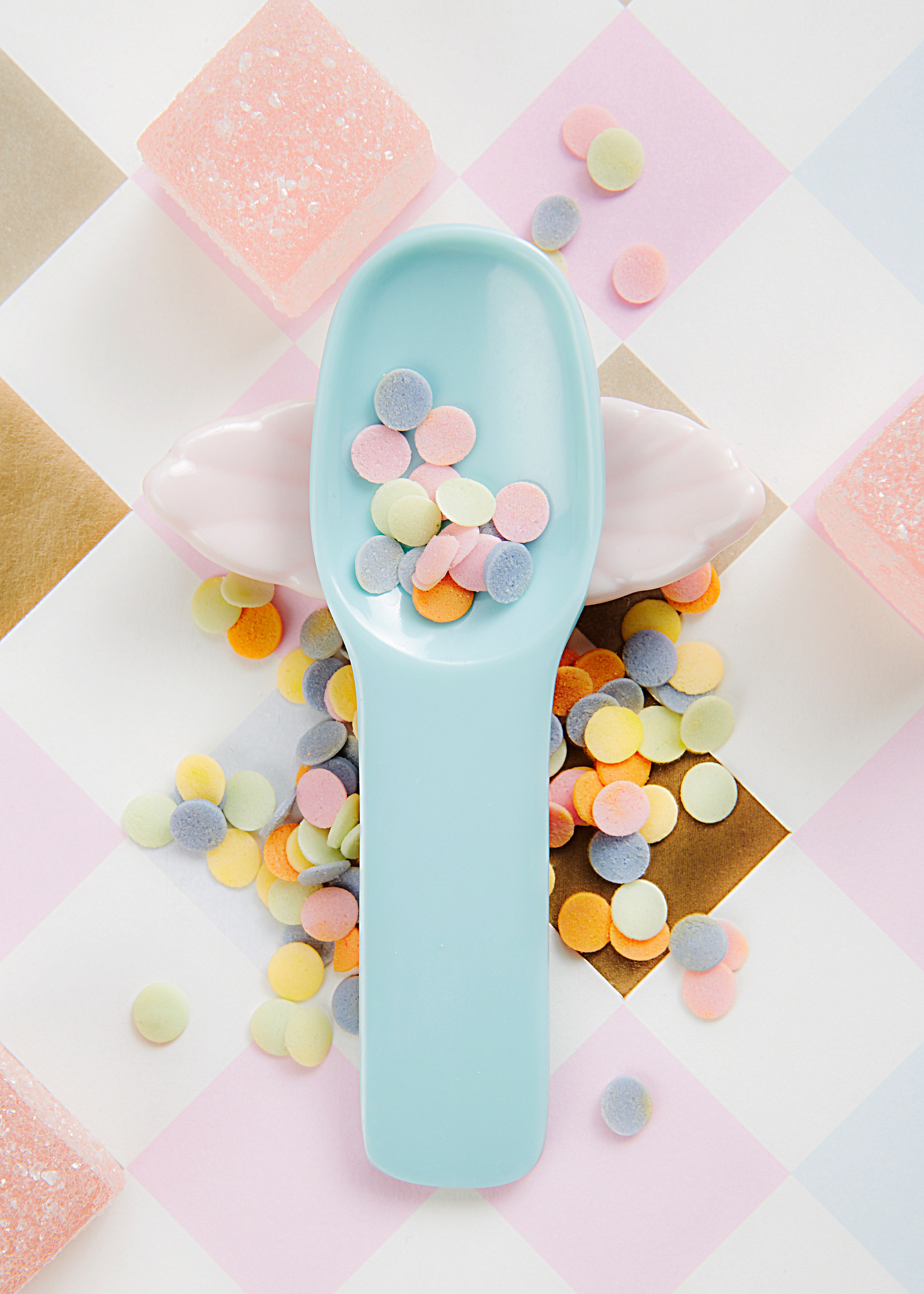 Food photographer Lol Johnson - personal project featuring a selection of thai sweets  with playful pastel backdrop and products. Styling by Liz Cooper.