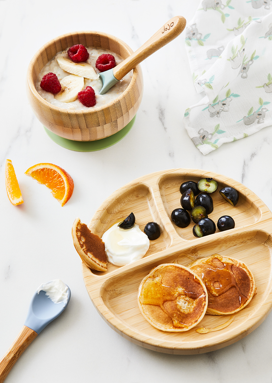 Still life photography of products from the Jojo Maman Bebe weaning range of tableware, shot by London based food and tableware photographer Lol Johnson. Food Prep and styling by El Kemp.