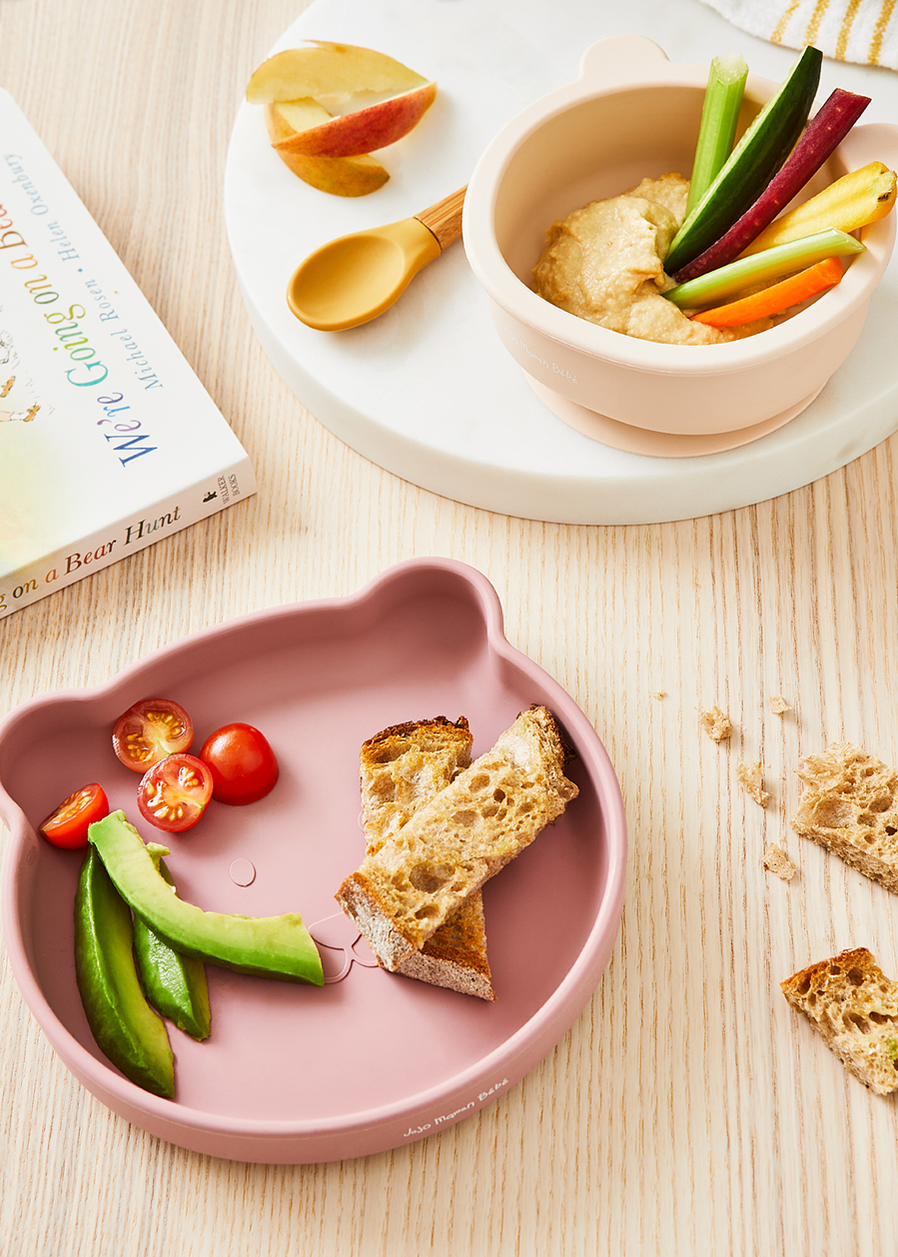 Still life photography of products from the Jojo Maman Bebe weaning range of tableware, shot by London based food and tableware photographer Lol Johnson. Food Prep and styling by El Kemp.