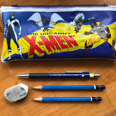 Drawing supplies: Staedtler Mars Lumograph 100 pencils, Magic Rub Eraser, X-Men zippered pencil case