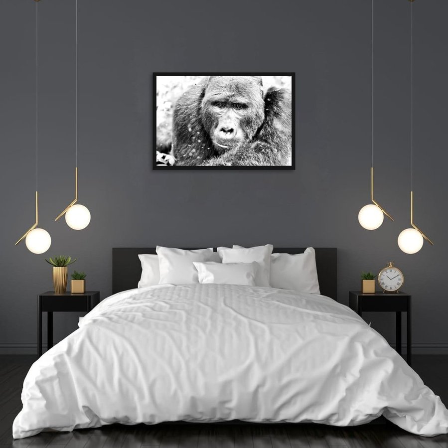 Original black and white portrait of a silverback mountain gorilla. Captured in the Bwindi Forest, this one-of-a-kind artwork reveals the emotional depth, gentleness, and sentient stillness of an endangered gorilla.

