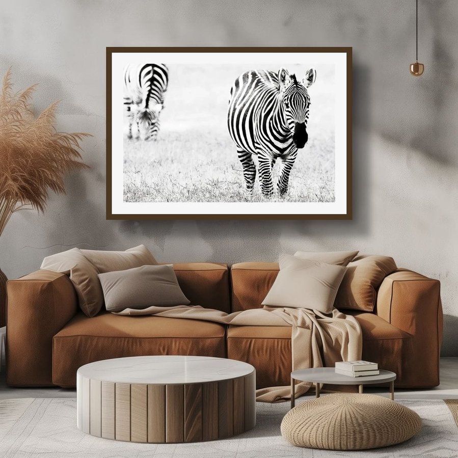 Black and white fine art photograph of a zebra, highlighting the bold contrast and intricate pattern of its stripes. A striking wildlife image celebrating the natural design and beauty of one of Africa’s most iconic animals.