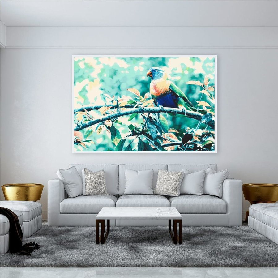 A softly abstract fine art image of a rainbow lorikeet perched in a dreamy, dappled canopy. Painterly tones of blue, green, and coral create a tranquil, watercolour-like moment in nature in a white frame.