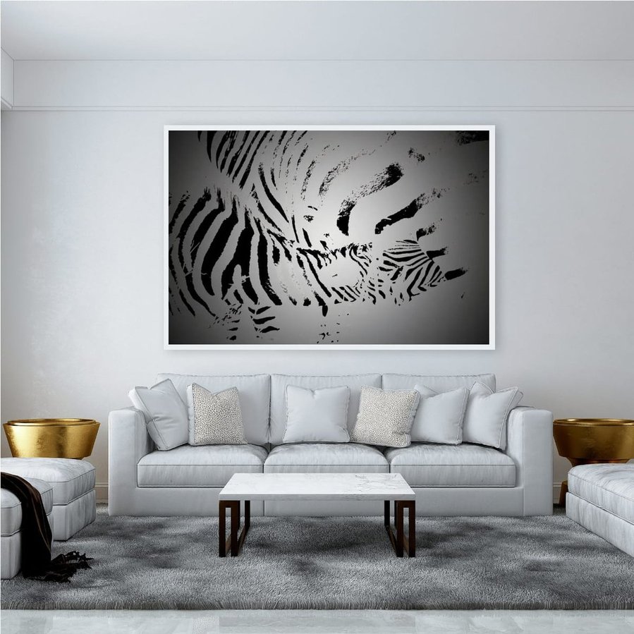 Black and white abstract zebra artwork of a mother nursing her foal. A striking fine art wildlife image highlighting maternal bond, bold contrast, and natural intimacy.