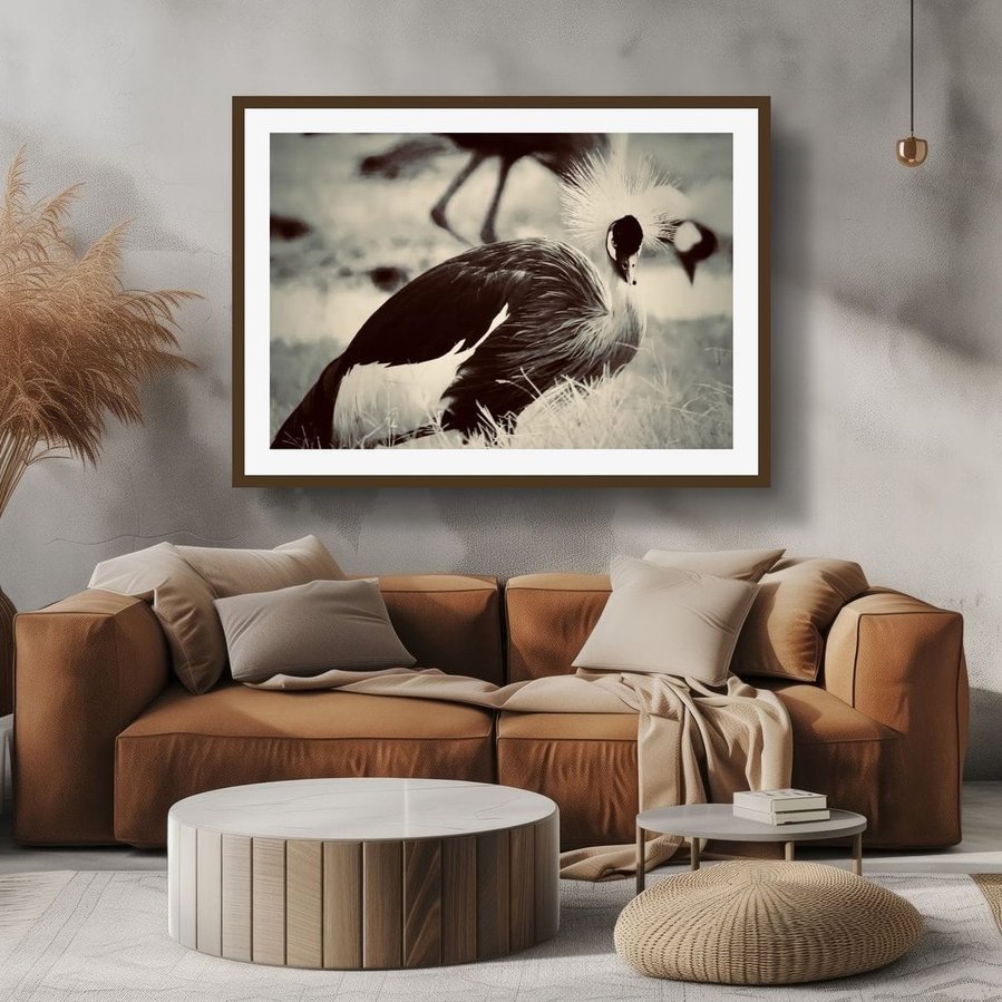 A striking portrait of Uganda’s national bird, captured in an intense, direct gaze. Its sharp eyes and intricate feathers showcase the wild beauty and spirit of Uganda’s rich avian life.