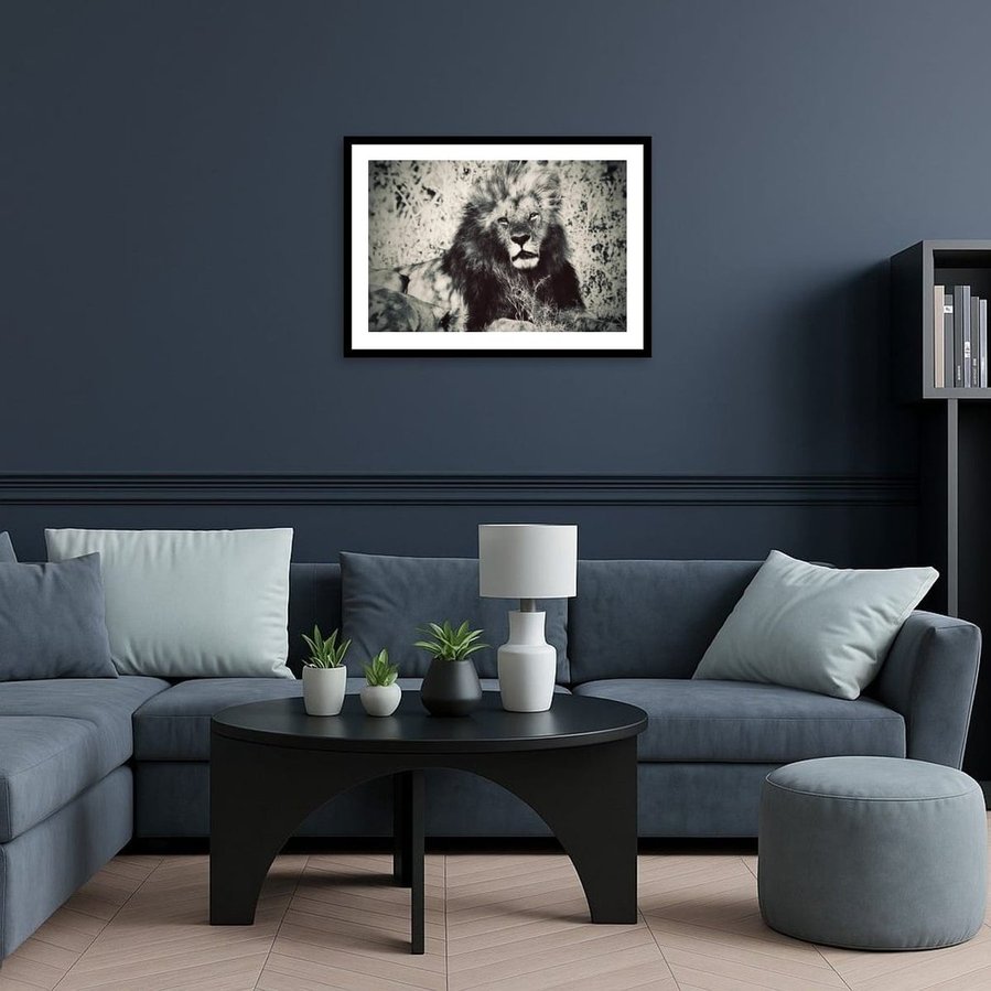 Black and white with warm tones fine art portrait of a male lion in Kenya’s Maasai Mara. This powerful wildlife image captures the lion’s intense gaze, majestic mane, and raw, untamed presence in the heart of the savanna.