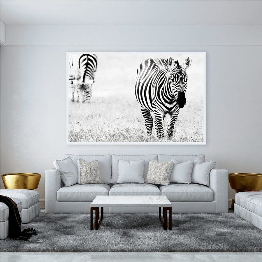 Black and white fine art photograph of a zebra, highlighting the bold contrast and intricate pattern of its stripes. A striking wildlife image celebrating the natural design and beauty of one of Africa’s most iconic animals.