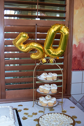 50th Wedding Anniversary decorations, gold balloons. 