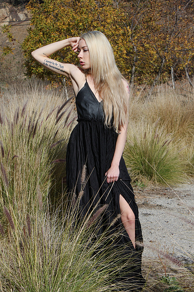 Black evening gown for formal or wedding reception. 