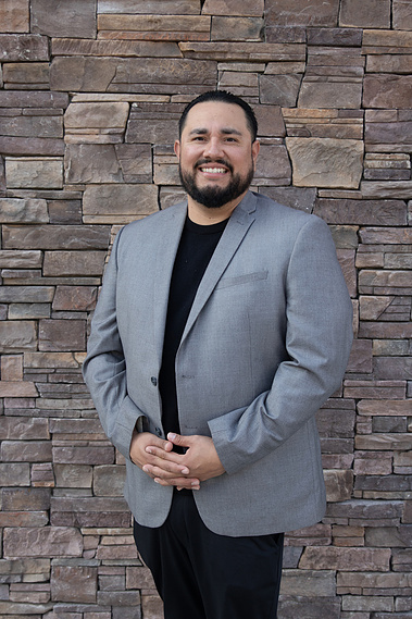 Head shot, professional photograph. 
