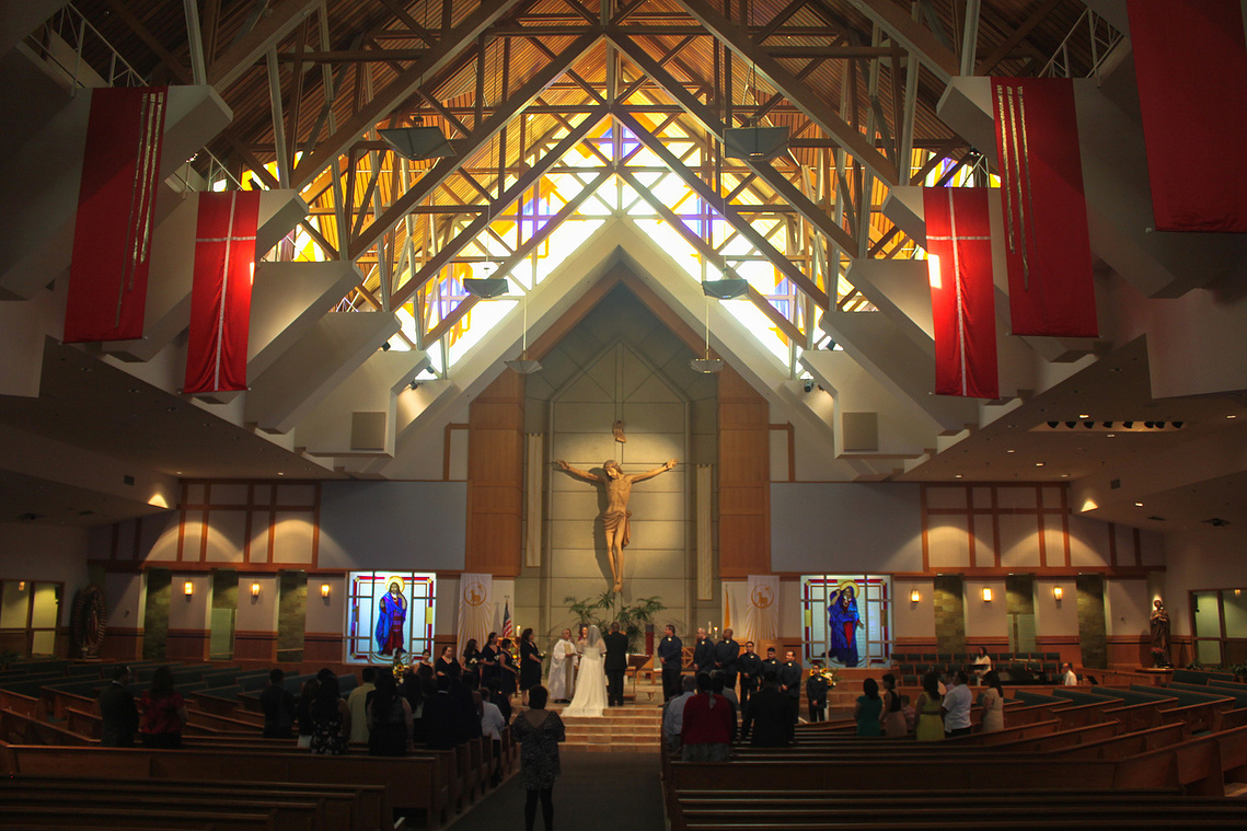 A photograph of a Catholic Church  wedding. 